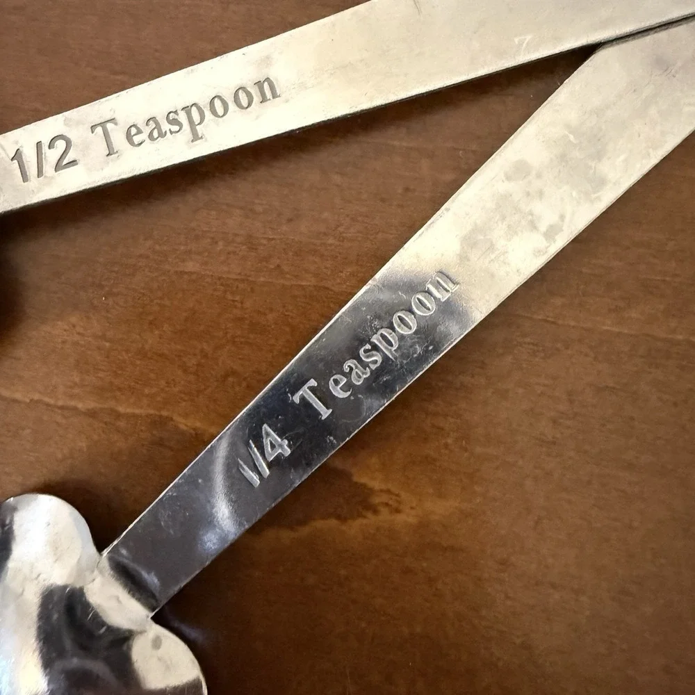 Set of 4 Stainless Steel Heart Shaped Measuring Spoons with Phrases